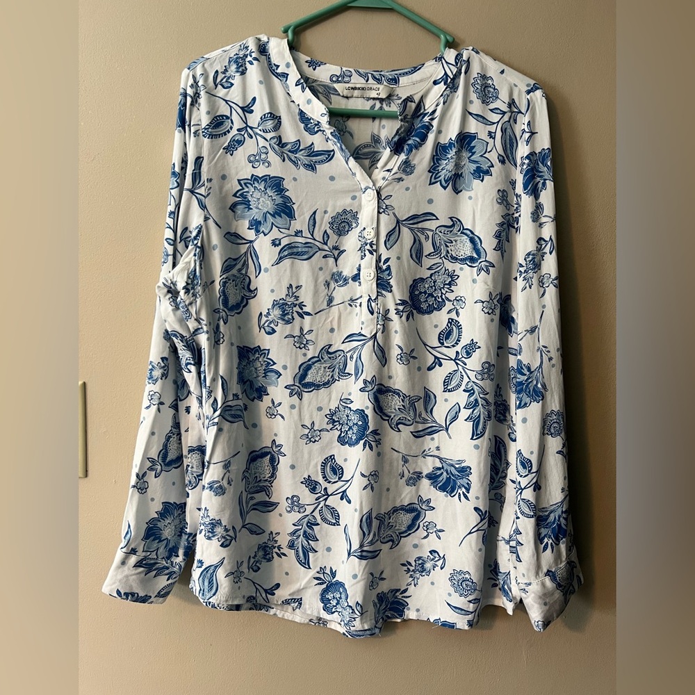 LC Waikiki Grace sz 42/XL long sleeve blue and white floral notch neck blouse.